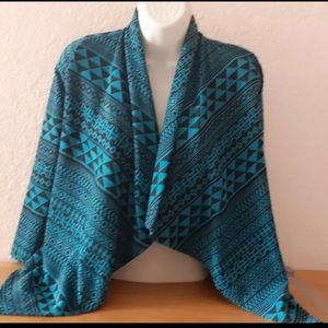 Tempted girls Sweater/Cardigan. Color: Blue & black.Size: 7-8. New without tags